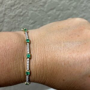 Selling all natural Emerald and Diamond 18k white gold tennis bracelet.